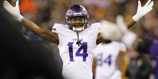 The Minnesota Vikings' Stefon Diggs celebrates during the second half against the Green Bay Packers on Sunday, Jan. 3, 2016, in Green Bay, Wis.