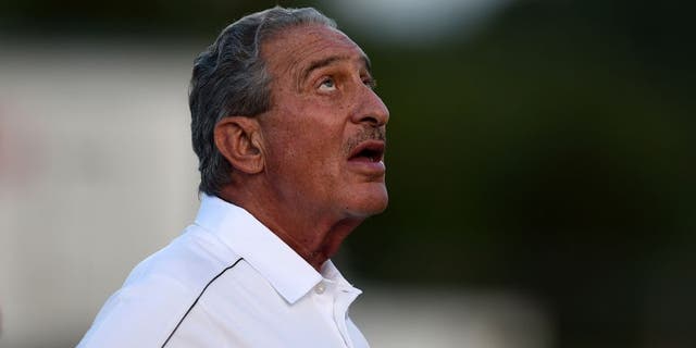 Aug 1, 2014; Lawrenceville, GA, USA; Atlanta Falcons team owner Arthur Blank watches skydivers land on the field during Atlanta Falcons practice during Falcons Friday Night Lights at Archer High School. Mandatory Credit: Dale Zanine-USA TODAY Sports