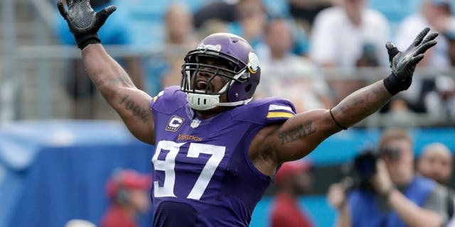 The Minnesota Vikings' Everson Griffen celebrates after a sack against the Carolina Panthers in the second half in Charlotte, N.C.