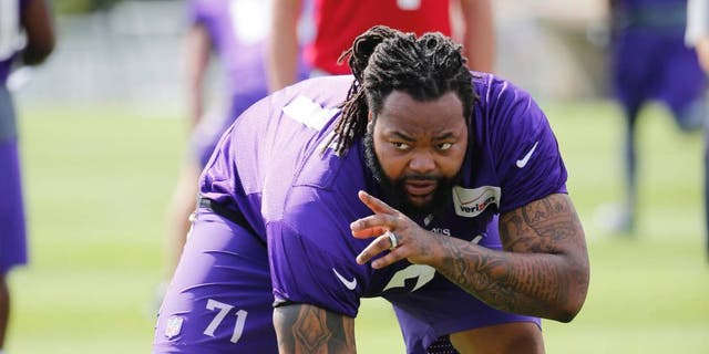 Sunday, July 26: Minnesota Vikings tackle Phil Loadholt identifies a defensive player during practice at training camp on the campus of Minnesota State University in Mankato.