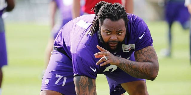 Sunday, July 26: Minnesota Vikings tackle Phil Loadholt identifies a defensive player during practice at training camp on the campus of Minnesota State University in Mankato.