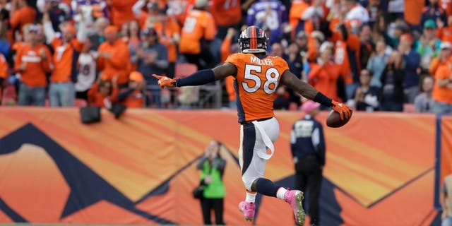 Denver Broncos outside linebacker Von Miller celebrates after sacking Minnesota Vikings quarterback Teddy Bridgewater during the second half in Denver on Sunday, Oct. 4, 2015.
