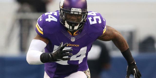 Nov 3, 2013; Arlington, TX, USA; Minnesota Vikings linebacker Gerald Hodges (54) in action against the Dallas Cowboys at AT&T Stadium.