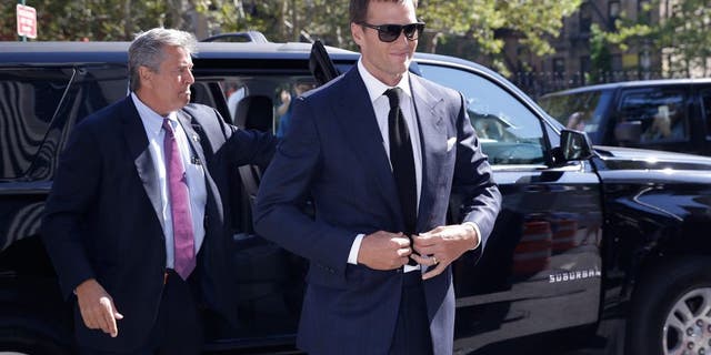 New England Patriots quarterback Tom Brady arrives at federal court, Wednesday, Aug. 12, 2015, in New York. Brady and NFL Commissioner Roger Goodell are set to explain to a judge why a controversy over underinflated footballs at last season's AFC conference championship game is spilling into a new season. (AP Photo/Mary Altaffer)