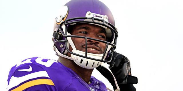 Minnesota Vikings running back Adrian Peterson looks on prior to the preseason game against the Pittsburgh Steelers at Tom Benson Hall of Fame Stadium on Aug. 9, 2015.