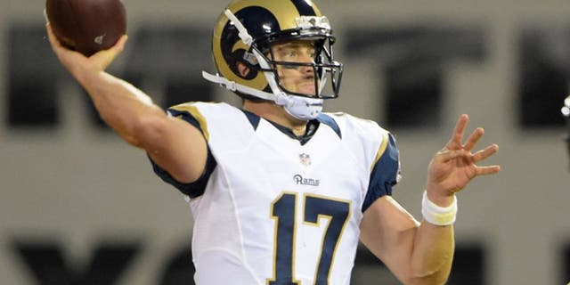 Aug 14, 2015; Oakland, CA, USA; St. Louis Rams quarterback Case Keenum throws a pass during the preseason NFL game against the Oakland Raiders at O.co Coliseum. Mandatory Credit: Kirby Lee-USA TODAY Sports