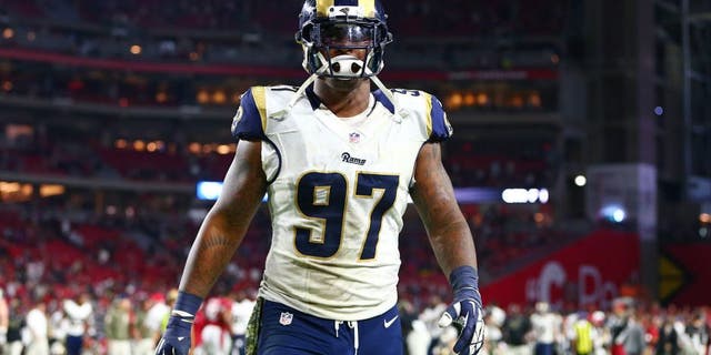 Nov 9, 2014; Glendale, AZ, USA; St. Louis Rams defensive end Eugene Sims (97) against the Arizona Cardinals at University of Phoenix Stadium. The Cardinals defeated the Rams 31-14. Mandatory Credit: Mark J. Rebilas-USA TODAY Sports