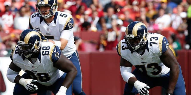 Sep 20, 2015; Landover, MD, USA; St. Louis Rams offensive guard Jamon Brown (68) and Rams tackle Greg Robinson (73) line up against the Washington Redskins at FedEx Field. Mandatory Credit: Geoff Burke-USA TODAY Sports