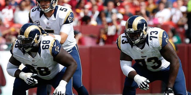 Sep 20, 2015; Landover, MD, USA; St. Louis Rams offensive guard Jamon Brown (68) and Rams tackle Greg Robinson (73) line up against the Washington Redskins at FedEx Field. Mandatory Credit: Geoff Burke-USA TODAY Sports