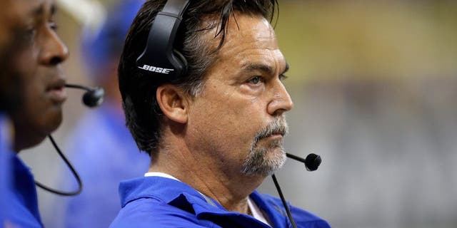 St. Louis Rams head coach Jeff Fisher watches from the sideline in the first quarter of an NFL football game against the San Francisco 49ers Monday, Oct. 13, 2014, in St Louis. (AP Photo/Scott Kane)