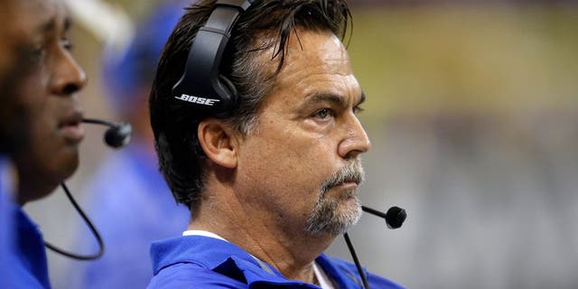 St. Louis Rams head coach Jeff Fisher watches from the sideline in the first quarter of an NFL football game against the San Francisco 49ers Monday, Oct. 13, 2014, in St Louis. (AP Photo/Scott Kane)