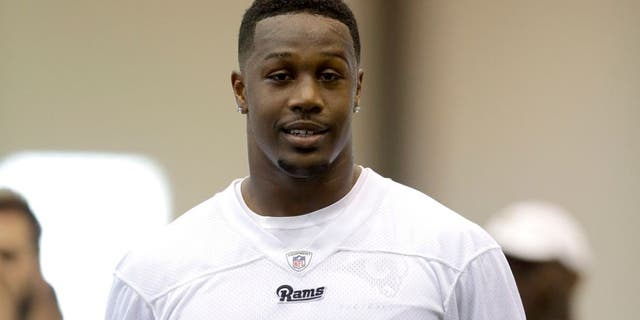 St. Louis Rams linebacker Akeem Ayers walks off the field at the end of practice during an NFL football organized team activity, Thursday, June 18, 2015, in St. Louis. (AP Photo/Jeff Roberson)