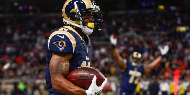 Nov 24, 2013; St. Louis, MO, USA; St. Louis Rams wide receiver Tavon Austin (11) carries the ball for a 65 yard touchdown during the first half against the Chicago Bears at the Edward Jones Dome. Mandatory Credit: Jeff Curry-USA TODAY Sports