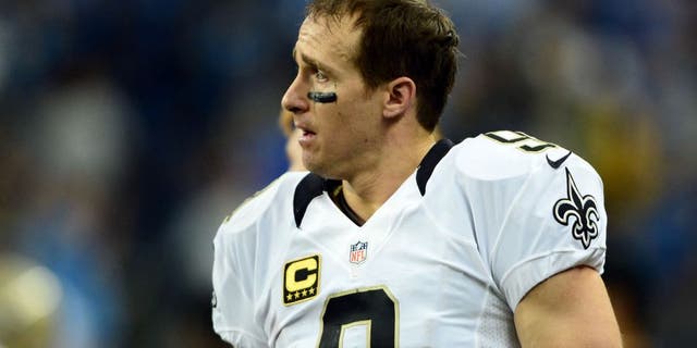 Oct 19, 2014; Detroit, MI, USA; New Orleans Saints quarterback Drew Brees (9) on the sidelines during the fourth quarter against the Detroit Lions at Ford Field. Lions defeated the Saints 24-23. Mandatory Credit: Andrew Weber-USA TODAY Sports