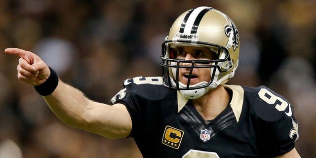 Dec 8, 2013; New Orleans, LA, USA; New Orleans Saints quarterback Drew Brees (9) against the Carolina Panthers during the second quarter of a game at Mercedes-Benz Superdome. Mandatory Credit: Derick E. Hingle-USA TODAY Sports