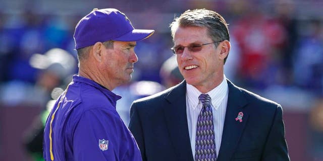 Minnesota Vikings head coach Mike Zimmer (left) speaks with general manager Rick Spielman prior to their game against the Kansas City Chiefs at TCF Bank Stadium in Minneapolis on Sunday, Oct. 18, 2015.