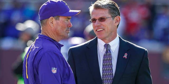 Minnesota Vikings head coach Mike Zimmer (left) speaks with general manager Rick Spielman prior to their game against the Kansas City Chiefs at TCF Bank Stadium in Minneapolis on Sunday, Oct. 18, 2015.