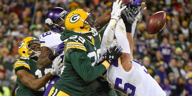 Green Bay Packers wide receiver James Jones cannot catch a Hail Mary pass in the last second of the game against Minnesota Vikings linebacker Anthony Barr at Lambeau Field in Green Bay, Wis., on Sunday, Jan. 3, 2016. The Vikings won 20-13.