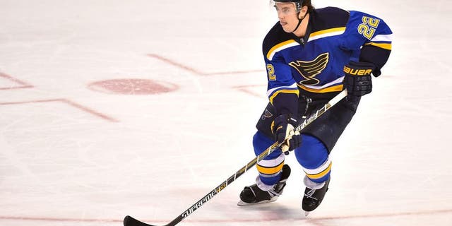 Dec 31, 2015; St. Louis, MO, USA; St. Louis Blues defenseman Kevin Shattenkirk (22) skates with the puck in the game against the Minnesota Wild during the third period at Scottrade Center. The Minnesota Wild defeat the St. Louis Blues 3-1. Mandatory Credit: Jasen Vinlove-USA TODAY Sports