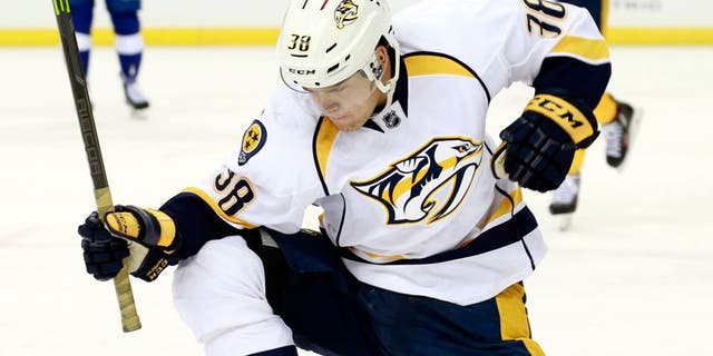 Sep 22, 2015; Tampa, FL, USA; Nashville Predators right wing Viktor Arvidsson (38) reacts as he scores a goal against the Tampa Bay Lightning during the third period at Amalie Arena. Nashville Predators defeated the Tampa Bay Lightning 3-2 in overtime. Mandatory Credit: Kim Klement-USA TODAY Sports