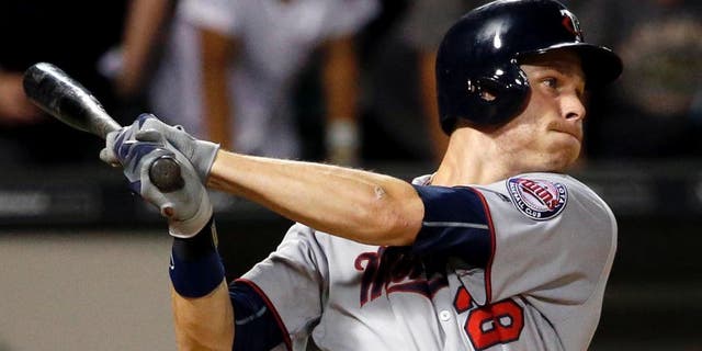 Minnesota Twins' Max Kepler watches his two-run double against the Chicago White Sox during the ninth inning of a baseball game in Chicago, Wednesday, June 29, 2016. Chicago won 9-6. (AP Photo/Nam Y. Huh)