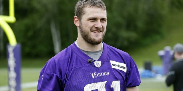 FILE - In this June 1, 2016, file photo, Minnesota Vikings wide receiver Moritz Boehringer, of Germany, is interviewed after practice in Eden Prairie, Minn. Boehringer's size and speed captured the attention of the Vikings, who took a chance on a raw wide receiver in the sixth round of the draft. (AP Photo/Jim Mone, File)
