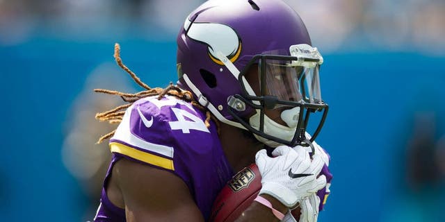 Sep 25, 2016; Charlotte, NC, USA; Minnesota Vikings wide receiver Cordarrelle Patterson (84) runs the ball during the first quarter against the Carolina Panthers at Bank of America Stadium. Mandatory Credit: Jeremy Brevard-USA TODAY Sports