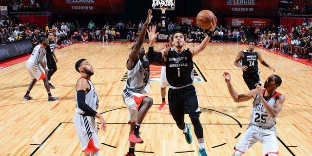 LAS VEGAS, NV - JULY 18: Tyus Jones #1 of the Minnesota Timberwolves shoots the ball against the Chicago Bulls during the 2016 NBA Las Vegas Summer League game on July 18, 2016 at the Thomas & Mack Center in Las Vegas, Nevada. NOTE TO USER: User expressly acknowledges and agrees that, by downloading and or using this photograph, User is consenting to the terms and conditions of the Getty Images License Agreement. Mandatory Copyright Notice: Copyright 2016 NBAE (Photo by David Dow/NBAE via Getty Images)
