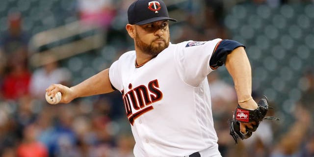 Minnesota Twins starting pitcher Ricky Nolasco delivers to the Kansas City Royals during the first inning.