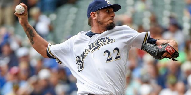 Aug 11, 2016; Milwaukee, WI, USA; Milwaukee Brewers pitcher Matt Garza throws a pitch in the first inning against the Atlanta Braves at Miller Park. Mandatory Credit: Benny Sieu-USA TODAY Sports