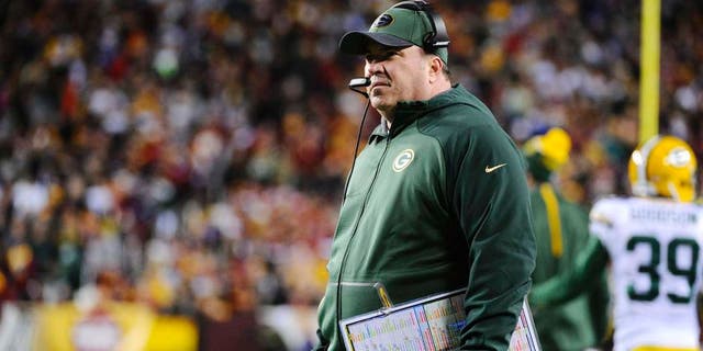 Jan 10, 2016; Landover, MD, USA; Green Bay Packers head coach Mike McCarthy looks on from the sidelines against the Washington Redskins during the second half in a NFC Wild Card playoff football game at FedEx Field. Mandatory Credit: Brad Mills-USA TODAY Sports