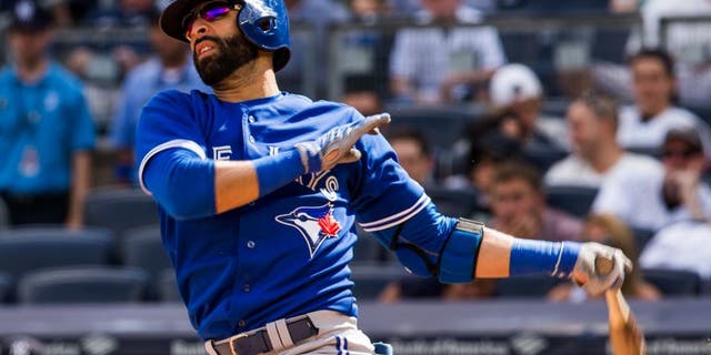 NEW YORK - SEPTEMBER 13: Jose Bautista #19 of the Toronto Blue Jays bats during the game against the New York Yankees at Yankee Stadium on September 13, 2015 in the Bronx borough of New York City. (Photo by Rob Tringali/SportsChrome/Getty Images)