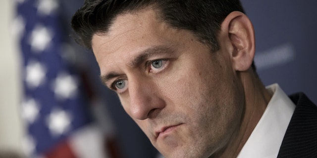 In this April 13, 2016, file photo House Speaker Paul Ryan of Wis., pauses during a news conference on Capitol Hill in Washington. Debt-ridden Puerto Rico faces a $422 million bond payment deadline May 1 with no sign Congress will act in time to help. Further complicating lawmakers efforts to steer the U.S. territory away from economic collapse are ads airing nationwide that claim the legislation amounts to a financial bailout even though the bill has no direct financial aid. House conservatives have latched onto that argument, making it difficult for Ryan, to garner support for the bill. (AP Photo/J. Scott Applewhite, File)