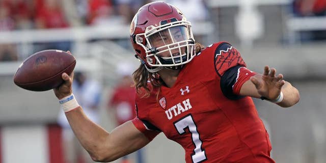 FILE - In this Aug. 28, 2014, file photo, Utah's Travis Wilson (7) throws the ball in the second quarter during an NCAA college football game against Idaho State in Salt Lake City. Wilson has thrown for 618 yards and has seven touchdowns with no interceptions as he leads the undefeated Utes (3-0) into Saturday's game against Washington State. (AP Photo/Rick Bowmer, File)