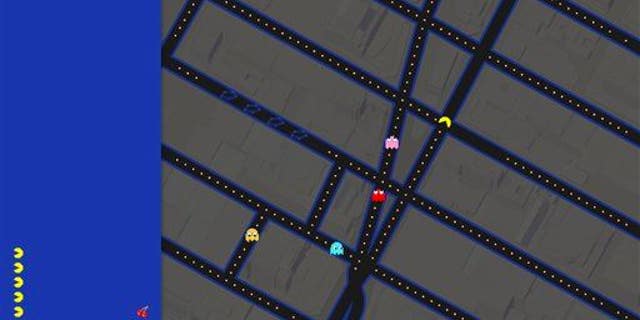 This screenshot shows the Times Square area of New York in Pac-Man form on Google Maps.