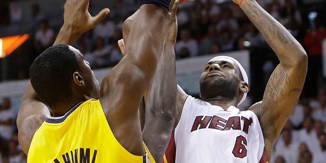 June 3, 2013: Miami Heat small forward LeBron James (6) shoots against Indiana Pacers center Ian Mahinmi (28) during the second half of Game 7 in their NBA basketball Eastern Conference finals playoff series.