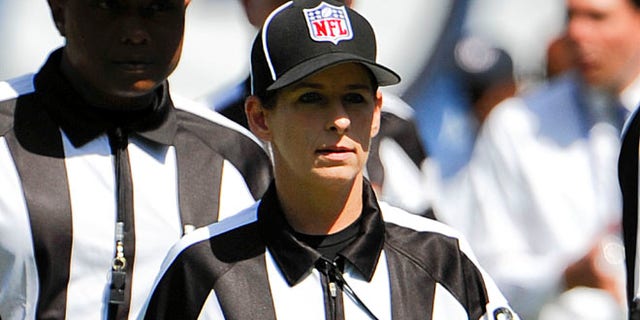 Aug. 9, 2012: Line Judge Shannon Eastin takes the field prior to an NFL preseason football game between the San Diego Chargers and the Green Bay Packers in San Diego.