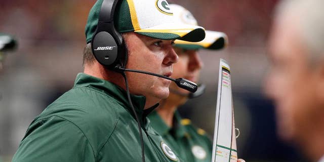 FILE - In this Aug. 16, 2014, file photo, Green Bay Packers head coach Mike McCarthy watches from the sidelines during the first quarter of an NFL preseason football game against the St. Louis Rams in St. Louis. The injury bug has hit the Packers again with two starters going down, but coach McCarthy has vowed to move forward.(AP Photo/Scott Kane, File)