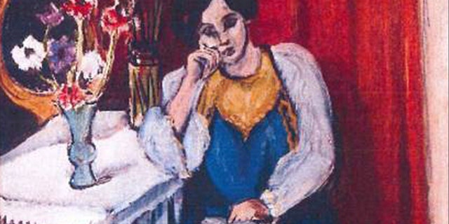 This is an unfated photo released by the police in Rotterdam, Netherlands, on Tuesday, Oct. 16, 2012, shows the 1919 painting 'Reading Girl in White and Yellow' by Henri Matisse.