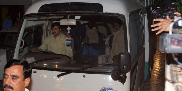 April 26, 2012: A minivan carries the family of Usama bin Laden, in Islamabad, Pakistan.