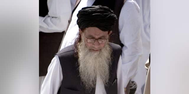FILE 2009: Pakistan’s hard line cleric Sufi Muhammad arrives to address his supporters in Mingora, Pakistan.