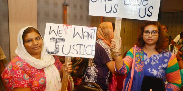 July 26, 2015: Pakistani Christian refugees protest UNHCR delays at a church in Thailand.