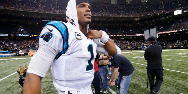 Carolina Panthers quarterback Cam Newton (1) walks on the field after an NFL football game against the New Orleans Saints in New Orleans, Sunday, Dec. 6, 2015. The Panthers won 41-38. (AP Photo/Bill Feig)