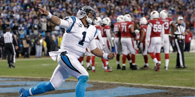 FILe - In this jan. 24, 2016, file photo, Carolina Panthers' Cam Newton celebrates his touchdown run during the first half the NFL football NFC Championship game against the Arizona Cardinals, n Charlotte, N.C. The Super Bowl bound Carolina Panthers have outscored their two playoff opponents 55-7 in the first half of games. (AP Photo/Chuck Burton, File)