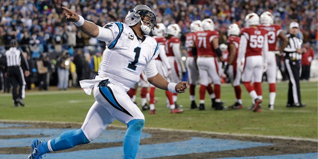 FILe - In this jan. 24, 2016, file photo, Carolina Panthers' Cam Newton celebrates his touchdown run during the first half the NFL football NFC Championship game against the Arizona Cardinals, n Charlotte, N.C. The Super Bowl bound Carolina Panthers have outscored their two playoff opponents 55-7 in the first half of games. (AP Photo/Chuck Burton, File)