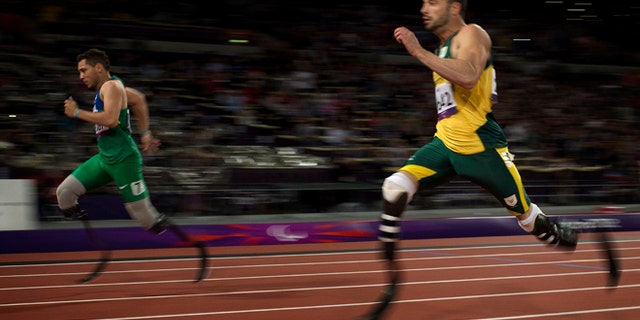 Sept. 2, 2012: Brazil's Alan Fonteles Cardoso Oliveira, left, beats South Africa's Oscar Pistorius in the 200-meter sprint at the 2012 Paralympics.