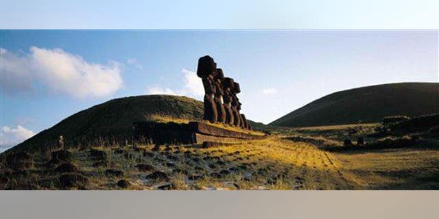 This undated photo released by Explora en Rapa Nui shows some of the massive Moai statues on Easter Island.