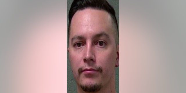 A Delta passenger was taken to jail after head-butting a fight attendant and yelling at another one.