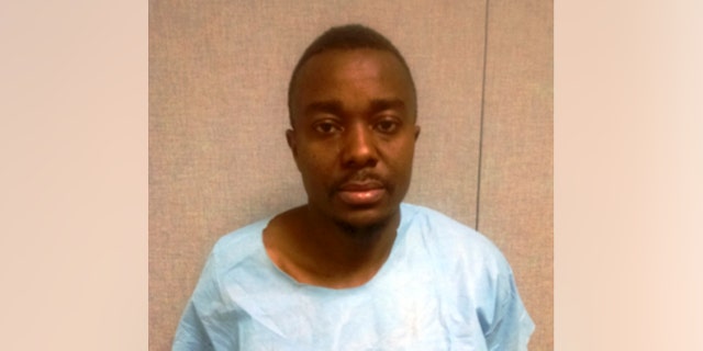 This image provided by the Montgomery County Police Department shows Roland Zinneh of Darby, Pa. Police in Maryland have charged Zinneh in the death of a Germantown pastor asked to pray over him to help stop voices he was hearing. Montgomery County Police said in a statement Friday, March 13, that Zinneh is charged with first-degree murder in the death of 57-year-old Connery Dagadu. (AP Photo/Montogomery County Police Department)