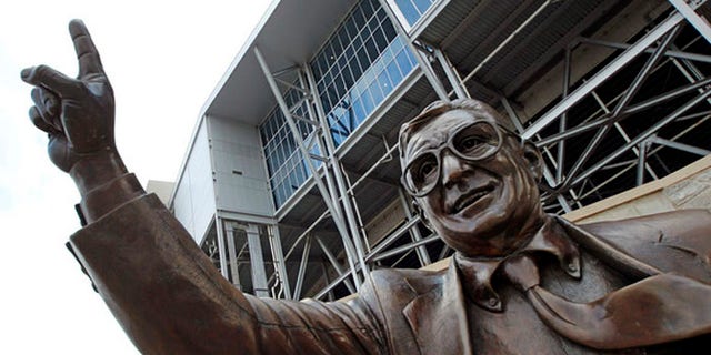 Waving goodbye? Iconic statue of legendary coach Joe Paterno has been removed from Happy Valley.